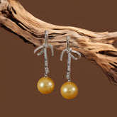 White Gold Finish Zircon & Yellow Freshwater Pearl Dangler Earrings In 925 Sterling Silver