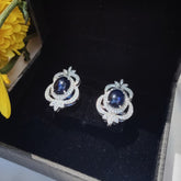 Blue Sapphire CZ Floral Stud Earrings in 925 Sterling Silver