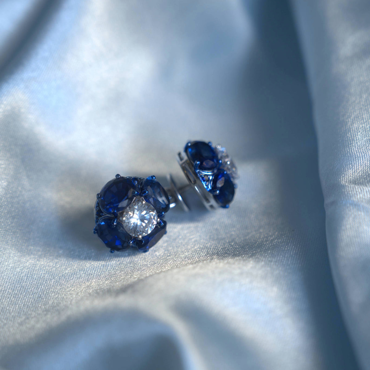 92.5 Pure Silver Stud Earrings with Centre Moissanite Diamond & Sapphire Stones